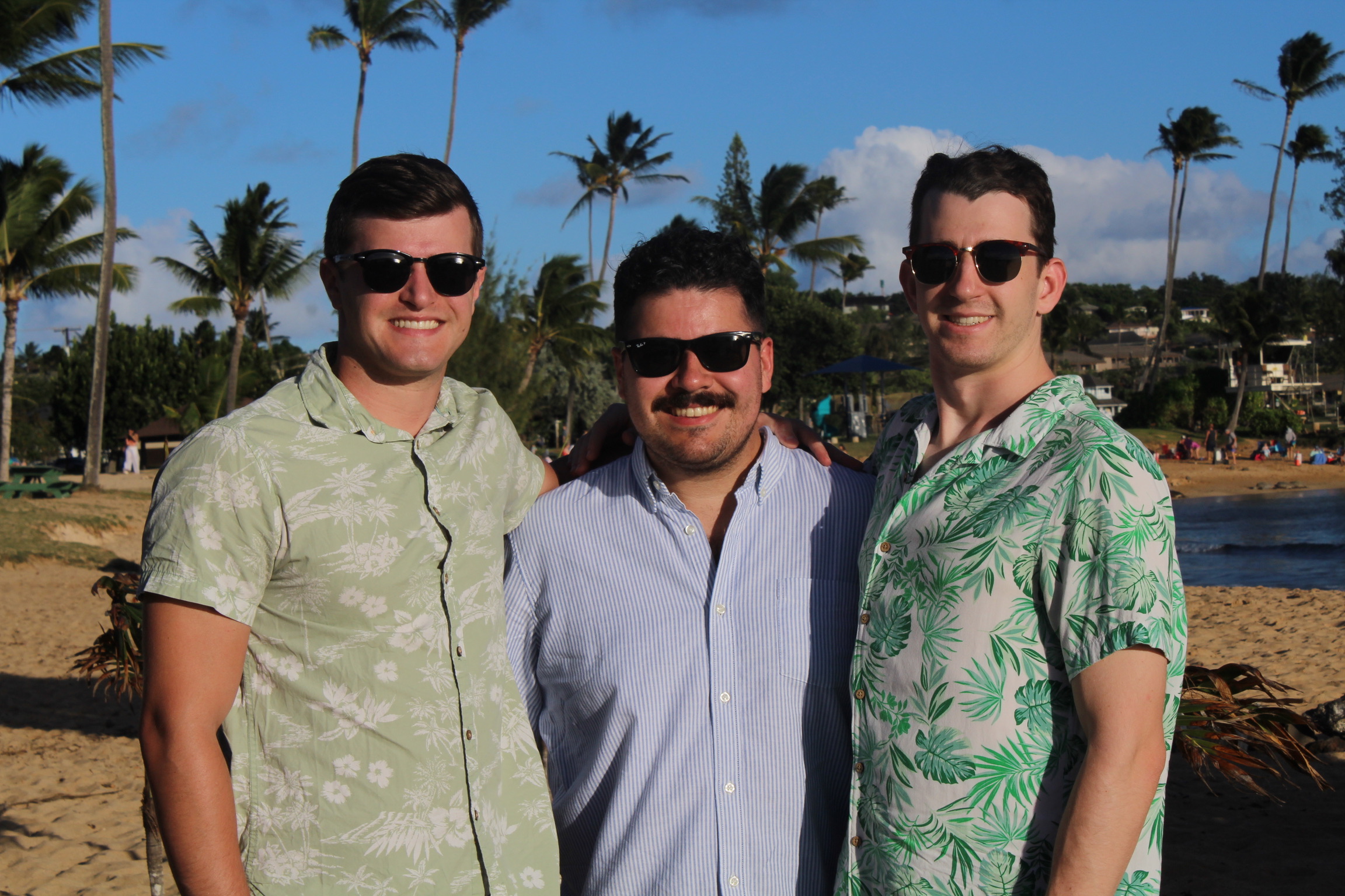 Poipu beach featuring Alex and my brother Chris by the beach.